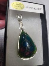 Load image into Gallery viewer, Custom Wire Wrapped Alumalite Recycled Aircraft Material Necklace/Pendant Sterling Silver