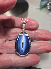 Load image into Gallery viewer, Custom Wire Wrapped Blue Fiberstone (Cats Eye) with Cross Necklace/Pendant Sterling Silver