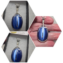 Load image into Gallery viewer, Custom Wire Wrapped Blue Fiberstone (Cats Eye) with Cross Necklace/Pendant Sterling Silver