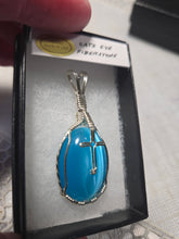 Load image into Gallery viewer, Custom Wire Wrapped Blue Fiberstone (Cats Eye) with Cross Necklace/Pendant Sterling Silver