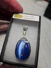Load image into Gallery viewer, Custom Wire Wrapped Blue Fiberstone (Cats Eye) with Cross Necklace/Pendant Sterling Silver