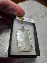 Load image into Gallery viewer, Custom Wire Wrapped 1800's Gaming Chip Hand Carved Mother of Pearl Necklace/Pendant  Sterling Silver