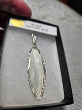 Load image into Gallery viewer, Custom Wire Wrapped 1800's Gaming Chip Hand Carved Mother of Pearl Necklace/Pendant Sterling  Silver